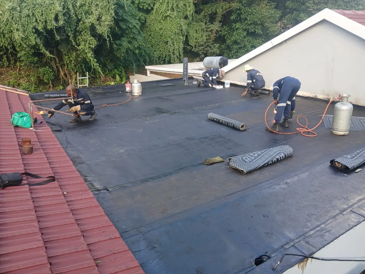 Torch-on waterproofing applied on residential roof in Durban